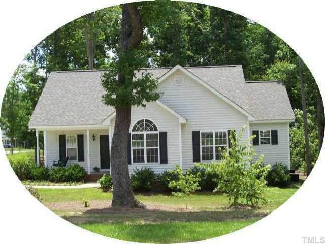 2605 Rifle Range Court Raleigh, NC 27610 - Photo 1 of 1 a front view of house with yard and green space