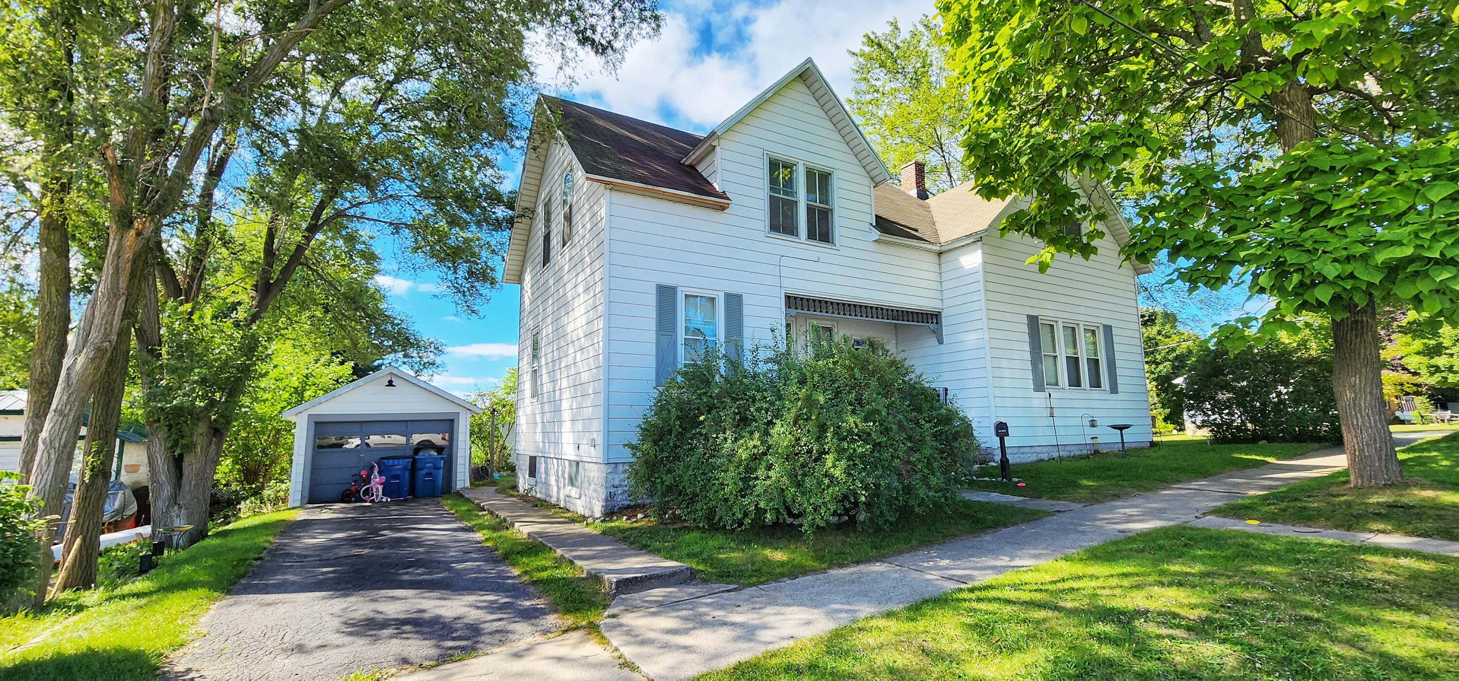 239 10th Street, Unit 2 Manistee, MI 49660 - Photo 24 of 27 Exterior sunny 20230830_110925-01 edited