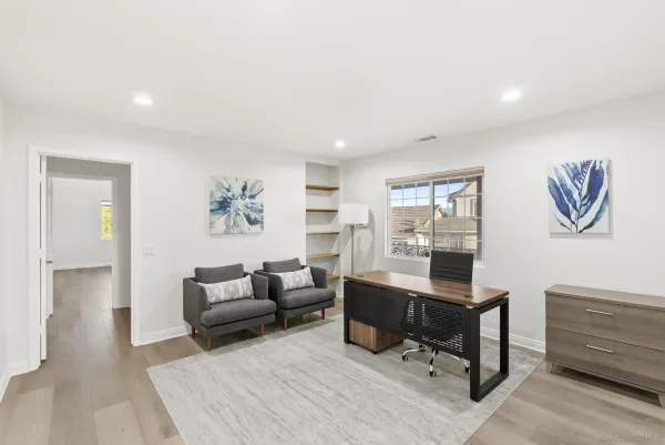 a view of a field with an ocean