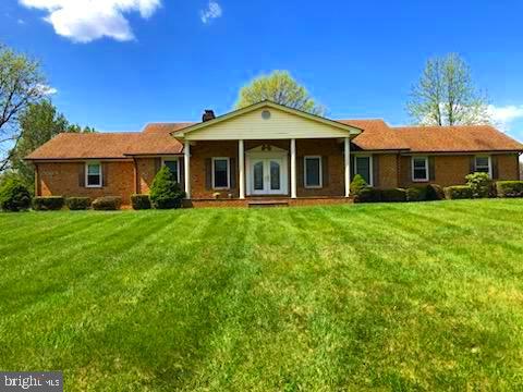 181 Grove Farm Road Front Royal, VA 22630 - Photo 1 of 35 a front view of a house with a yard