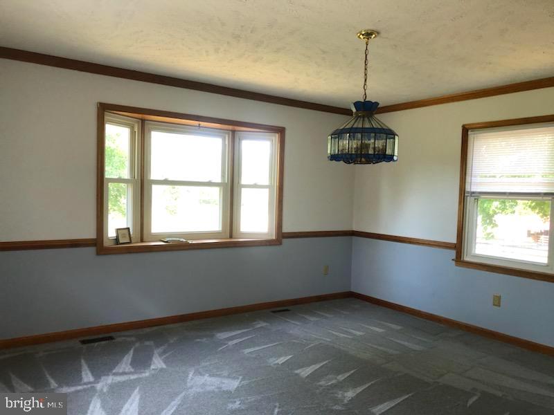 181 Grove Farm Road Front Royal, VA 22630 - Photo 20 of 35 a view of an empty room with a window