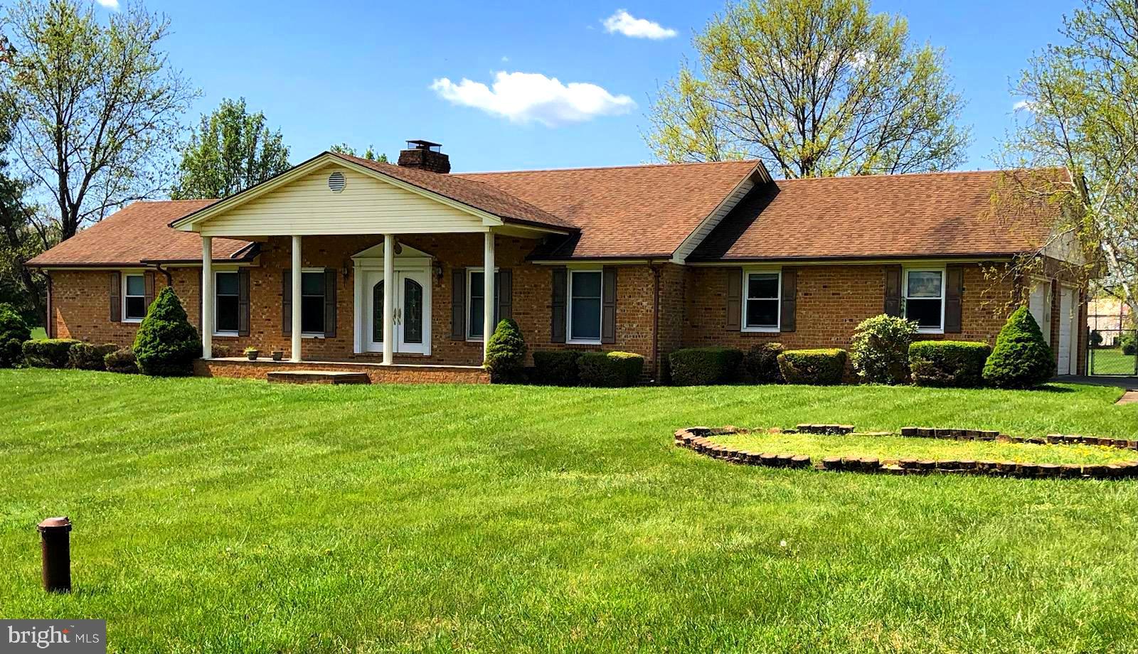 181 Grove Farm Road Front Royal, VA 22630 - Photo 2 of 35 a front view of a house with a yard
