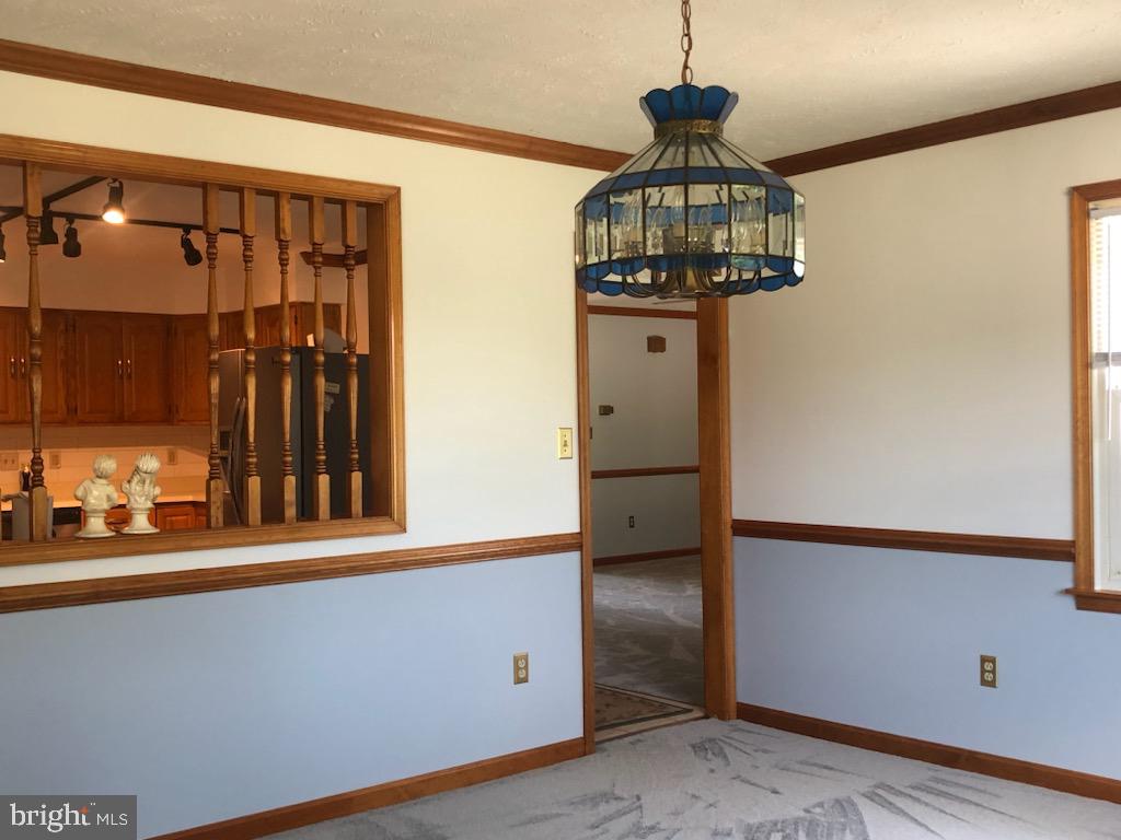 181 Grove Farm Road Front Royal, VA 22630 - Photo 21 of 35 a view of a hallway with wooden floor