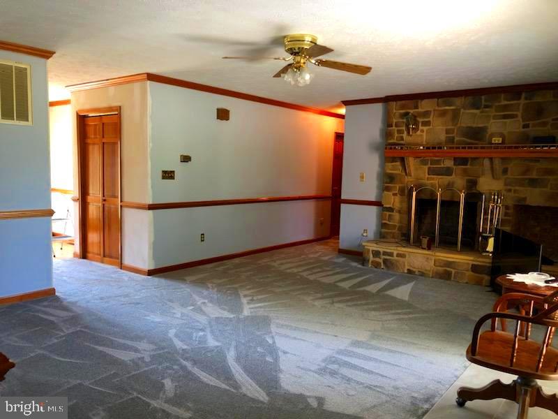 181 Grove Farm Road Front Royal, VA 22630 - Photo 24 of 35 a view of a room with gym equipment