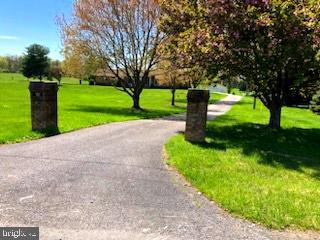 181 Grove Farm Road Front Royal, VA 22630 - Photo 3 of 35 a view of a park with large trees