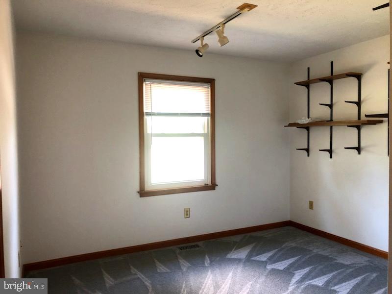 181 Grove Farm Road Front Royal, VA 22630 - Photo 31 of 35 an empty room with windows