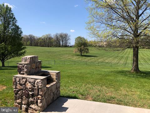 181 Grove Farm Road Front Royal, VA 22630 - Photo 9 of 35 a view of a garden from a patio