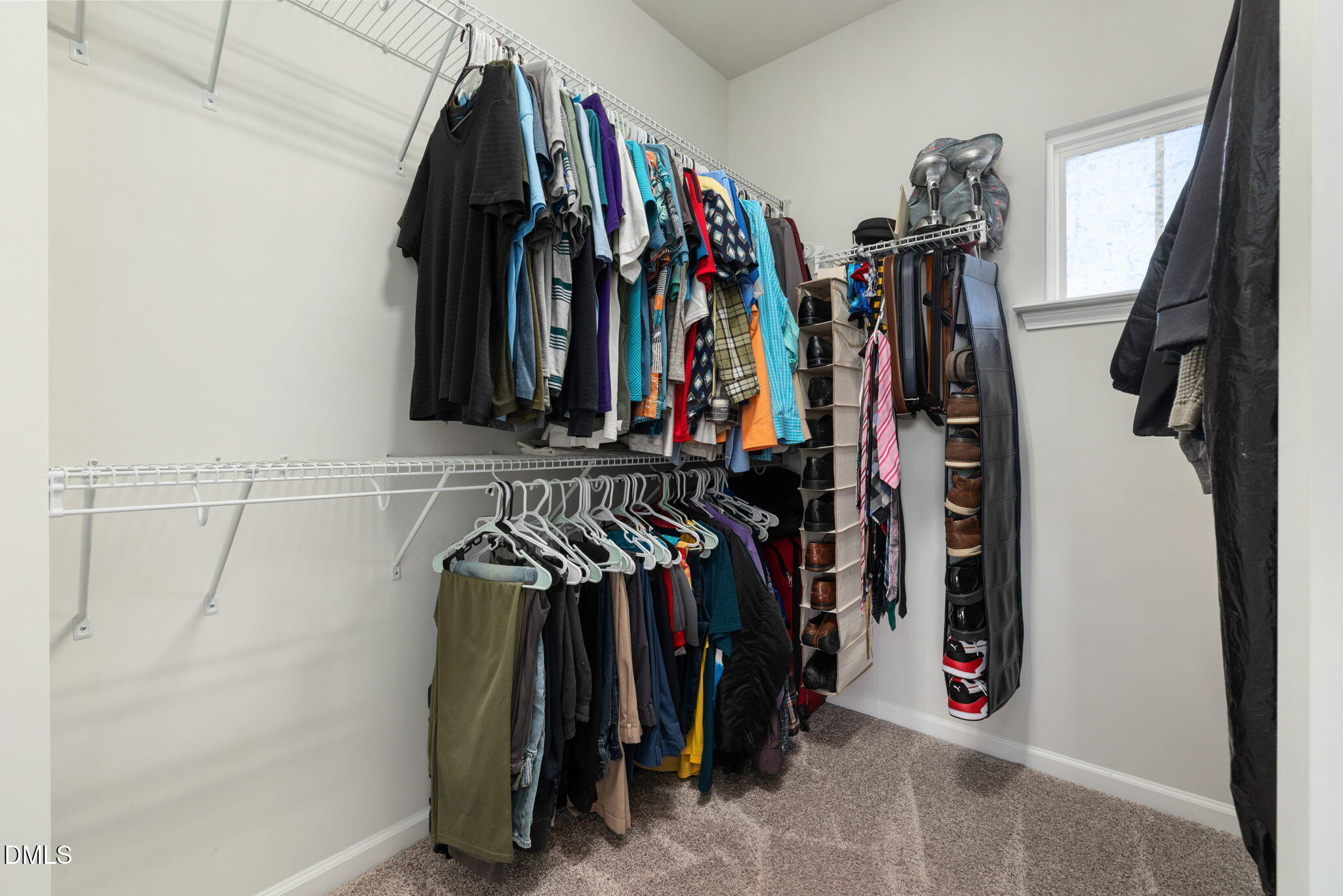 3422 Longleaf Estates Drive Raleigh, NC 27616 - Photo 42 of 71 a view of walk in closet with clothes