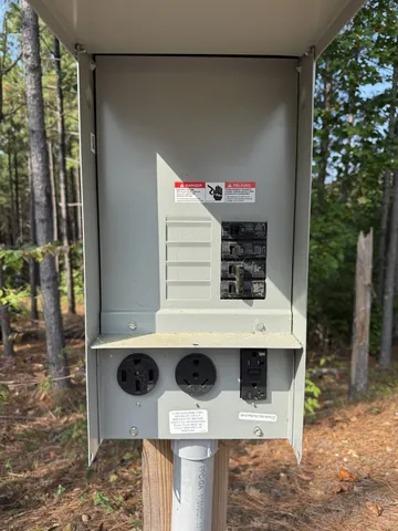 a kitchen view of a sink and a stove
