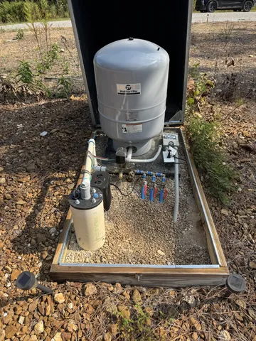 a view of water heater and a stove