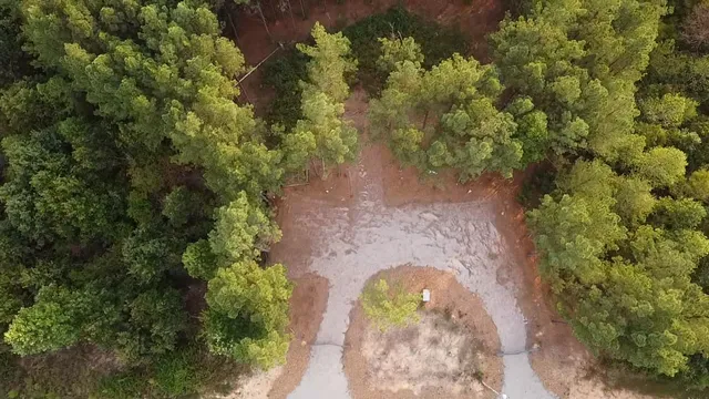 a view of a covered with wooden fence