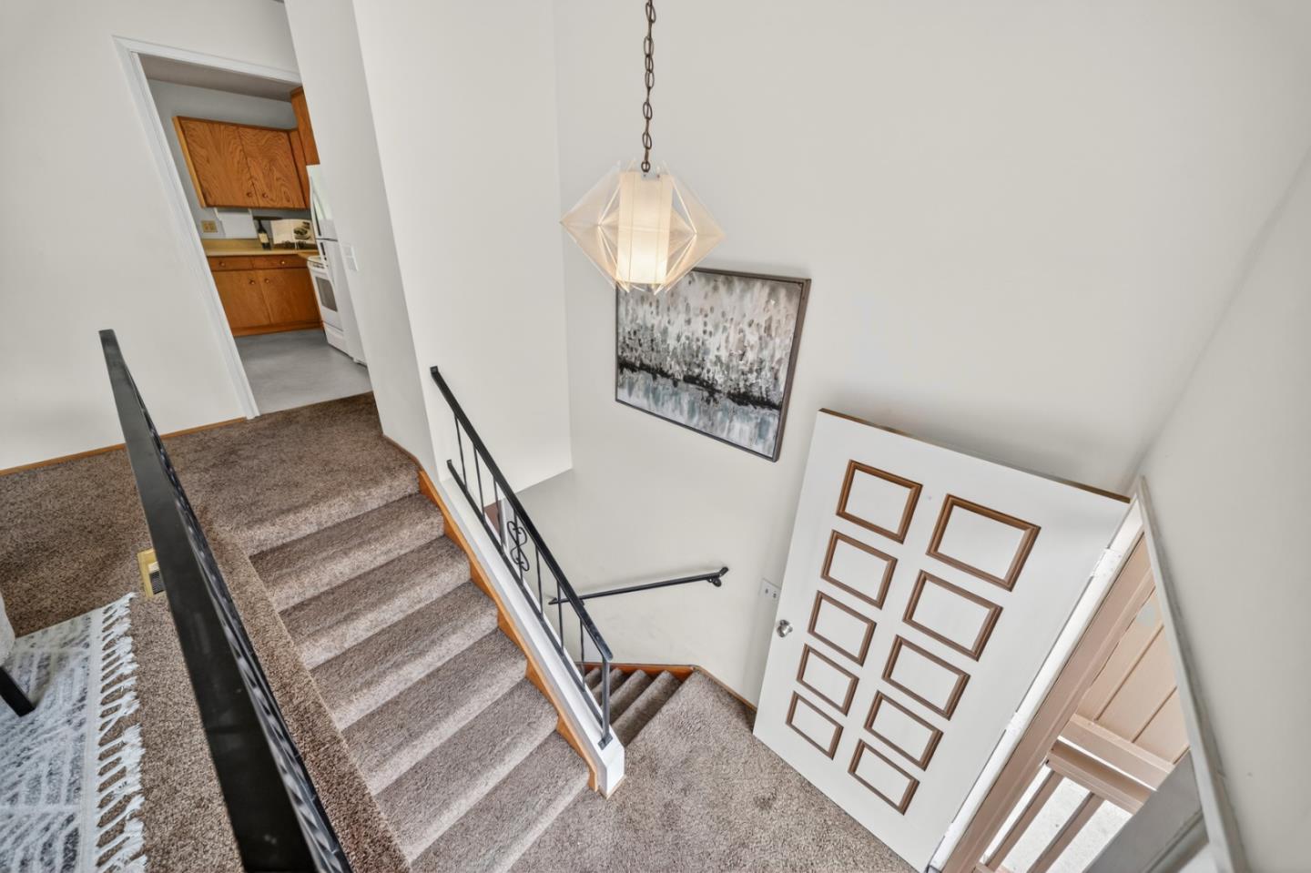 1287 Lerida Way Pacifica, CA 94044 - Photo 13 of 52 a view of entryway and hall with wooden floor
