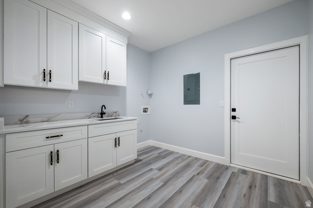 476 Spring Drive Toquerville, UT 84774 - Photo 62 of 95 Laundry room with light wood-style flooring, electric panel, cabinet space, hookup for a washing machine, and recessed lighting