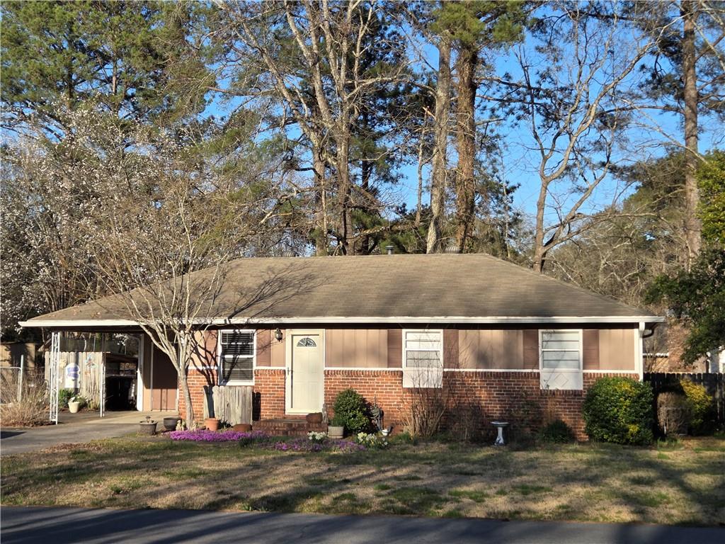 16 Billy Pyle Road Southwest Rome, GA 30165 - Photo 1 of 1 a front view of a house with a yard