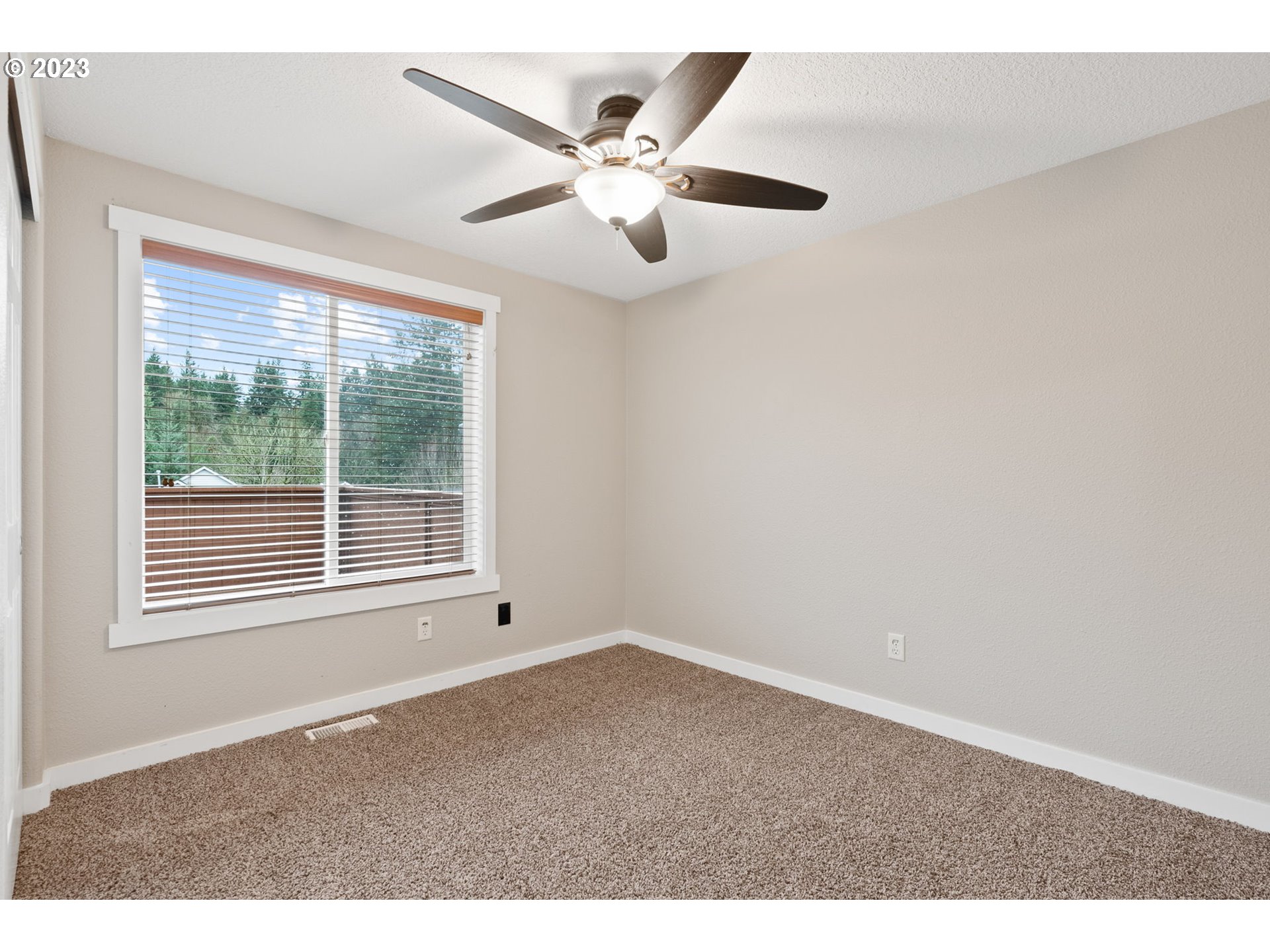 38446 Miller Street Sandy, OR 97055 - Photo 24 of 40 a view of an empty room with a window