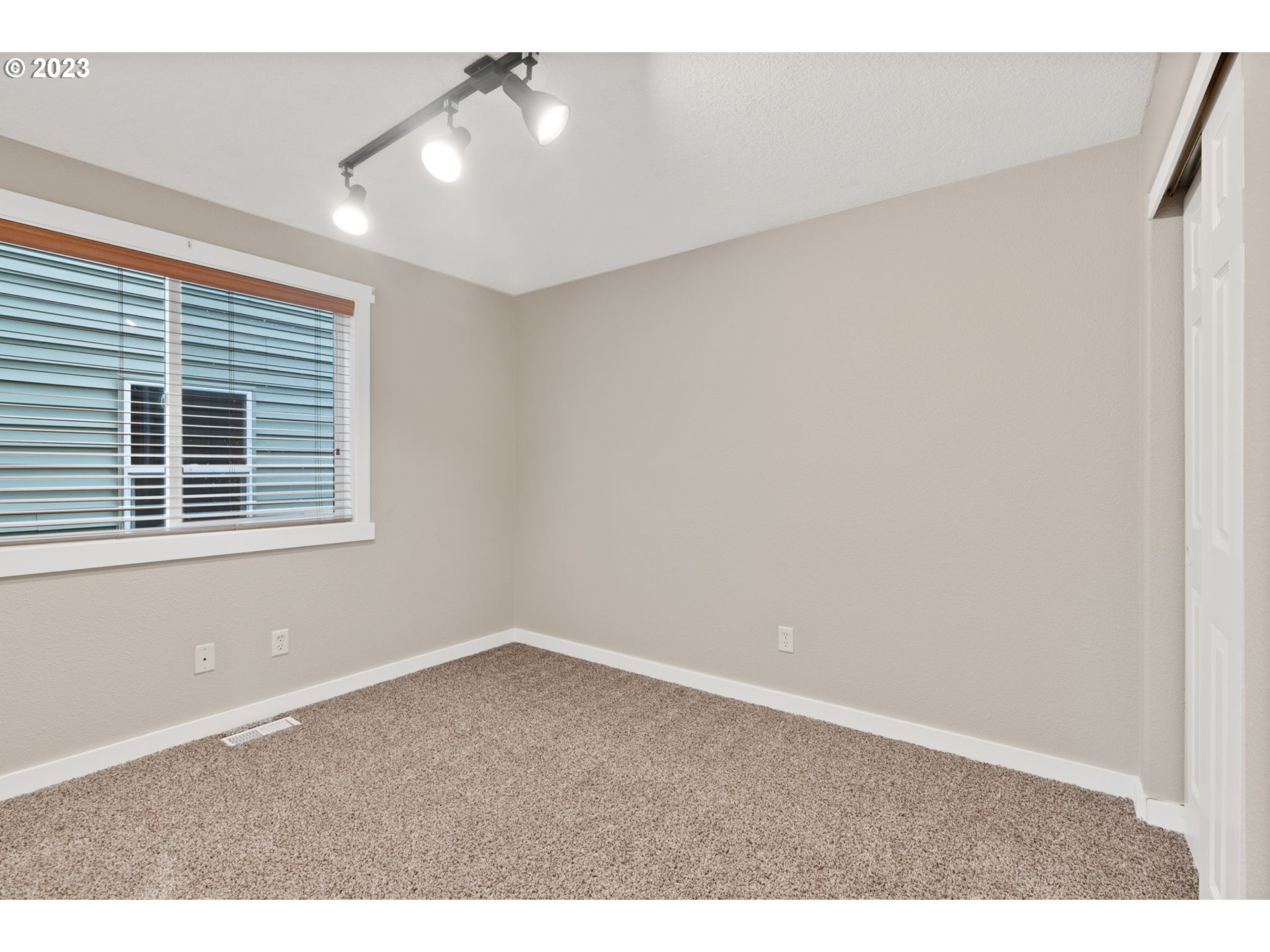 38446 Miller Street Sandy, OR 97055 - Photo 26 of 40 a view of an empty room with a window