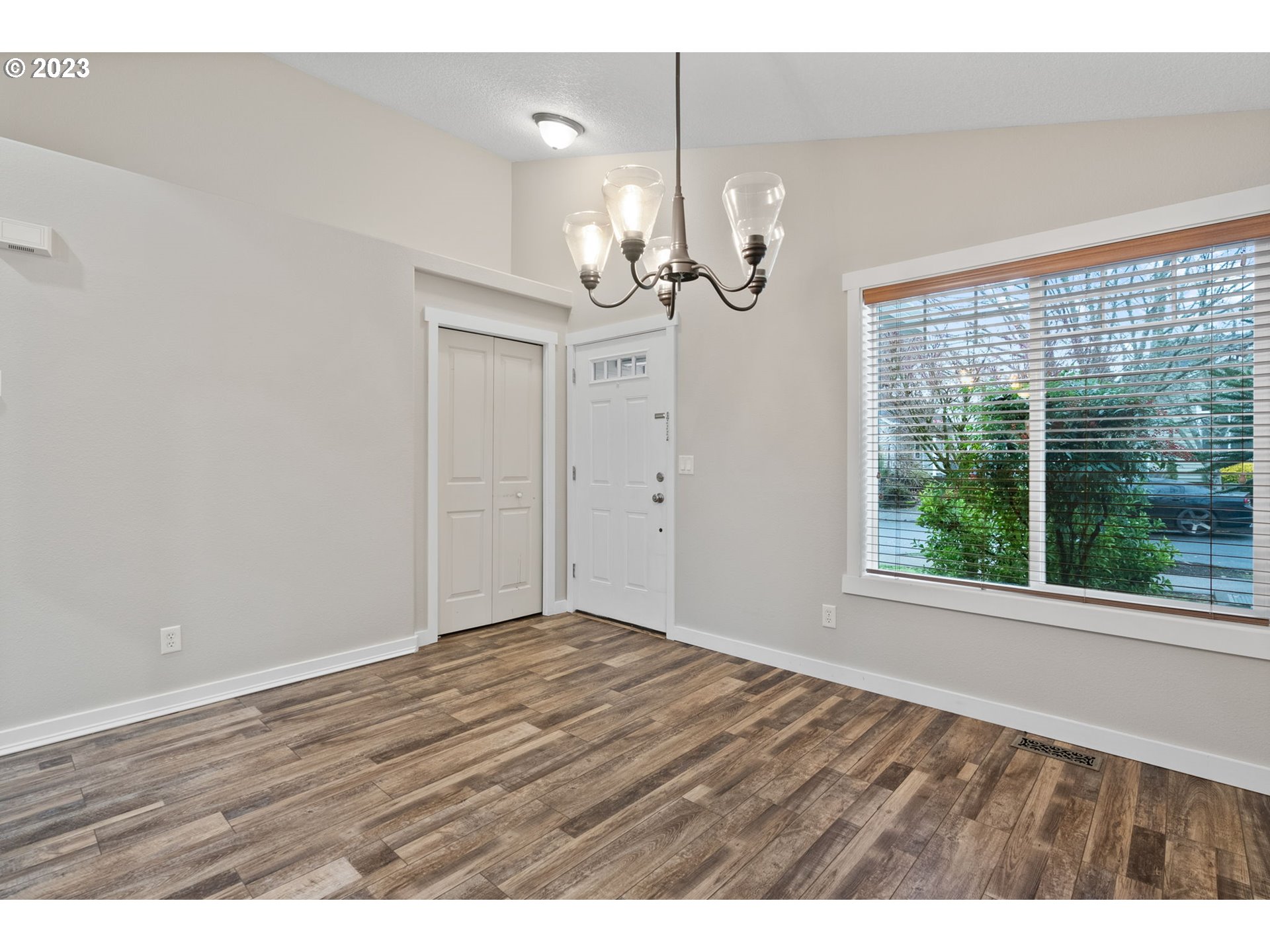 38446 Miller Street Sandy, OR 97055 - Photo 5 of 40 wooden floor in an empty room with a window