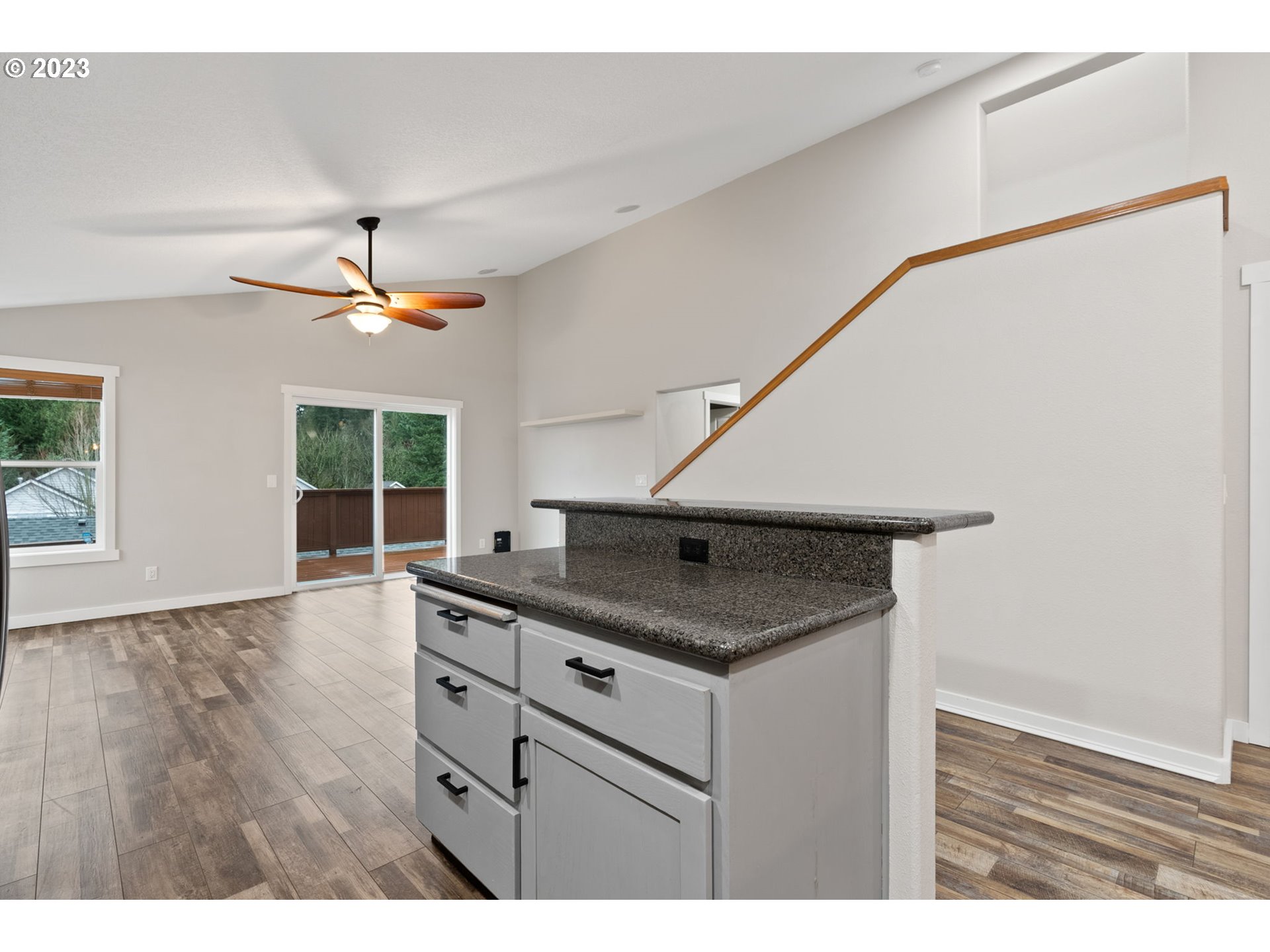38446 Miller Street Sandy, OR 97055 - Photo 10 of 40 a kitchen with a sink a refrigerator and wooden floor