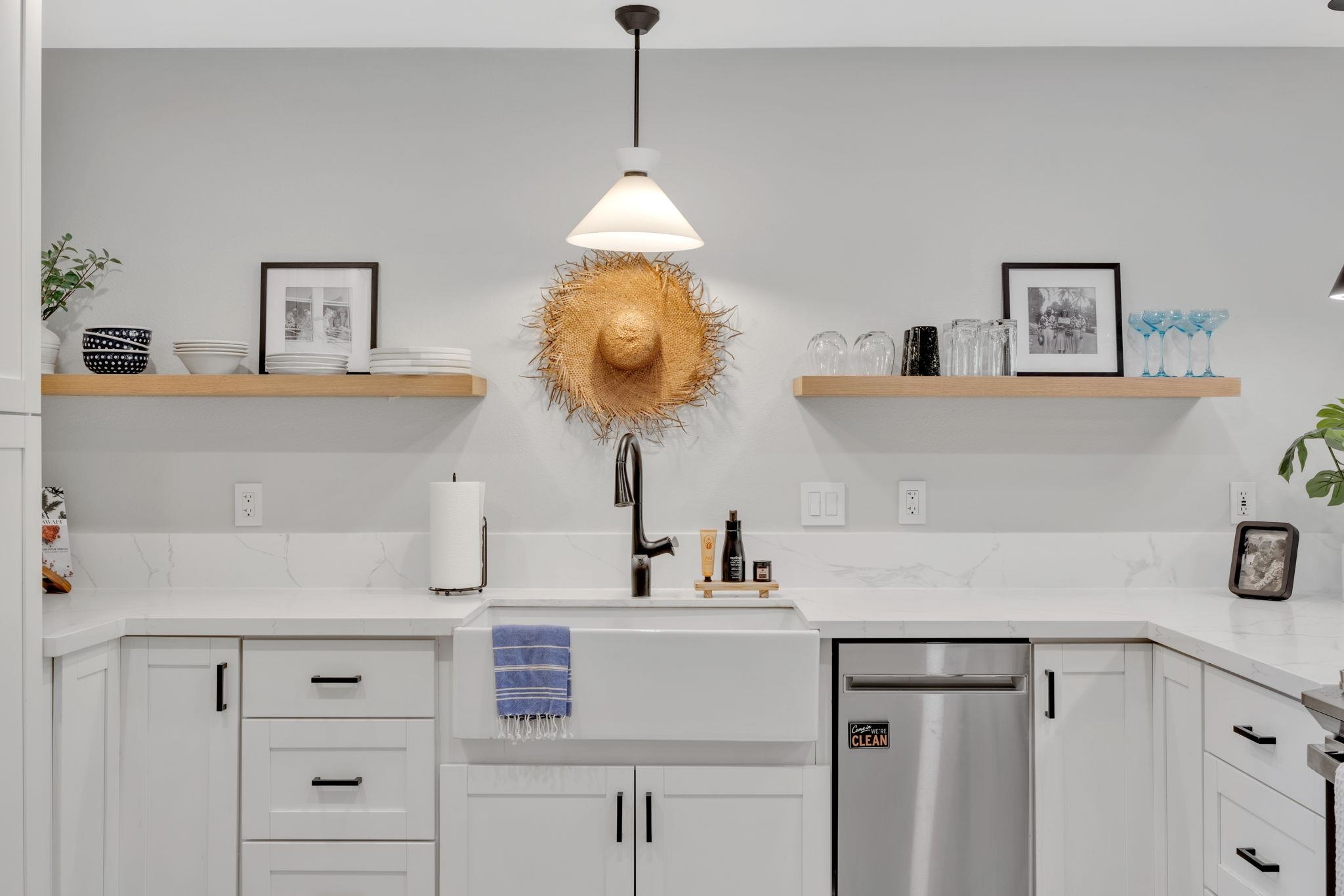 1450 South Kihei Road, Unit C206 Kihei, HI 96753 - Photo 31 of 50 a kitchen with cabinets appliances and a window