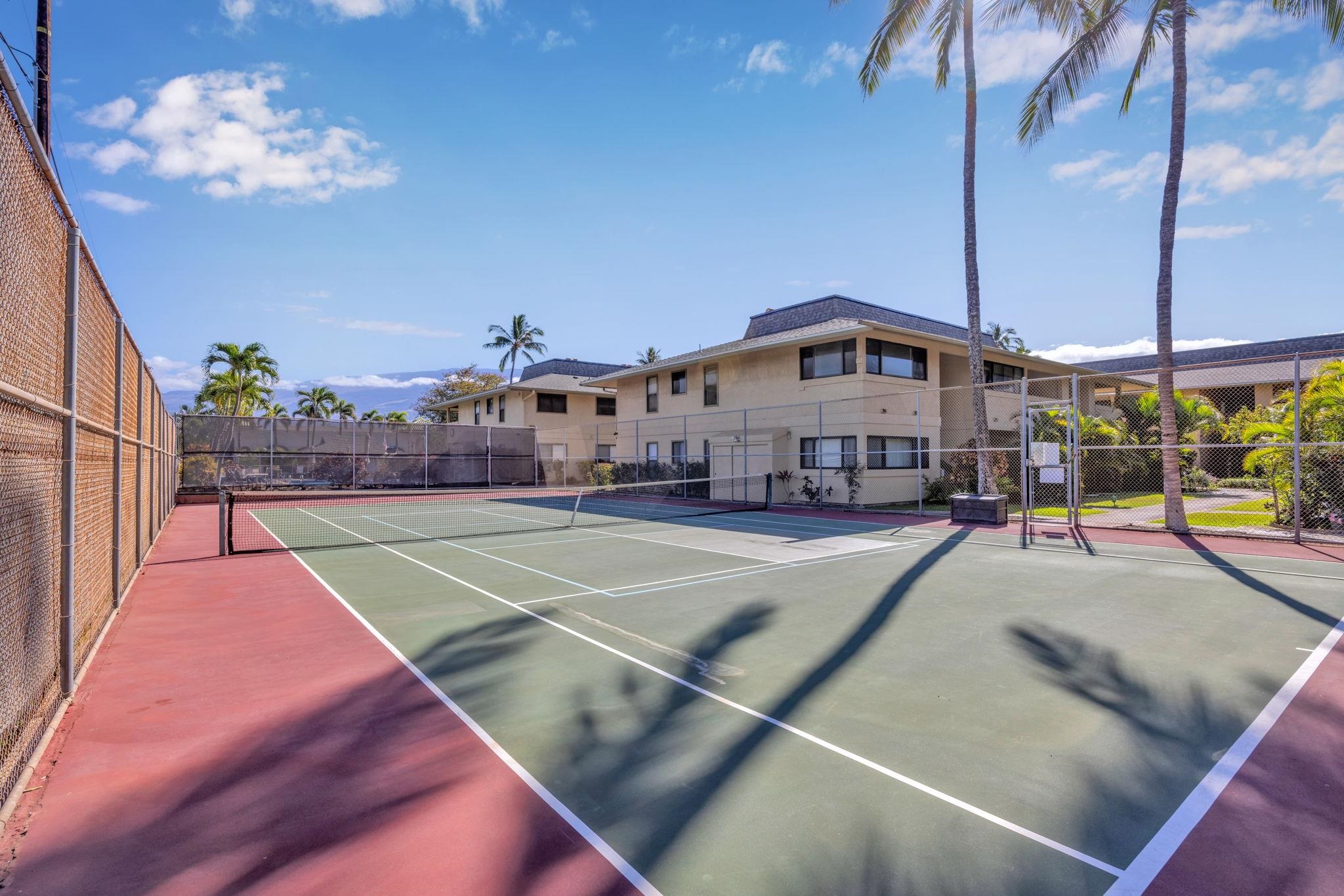 1450 South Kihei Road, Unit C206 Kihei, HI 96753 - Photo 50 of 50 a view of a swimming pool with a patio