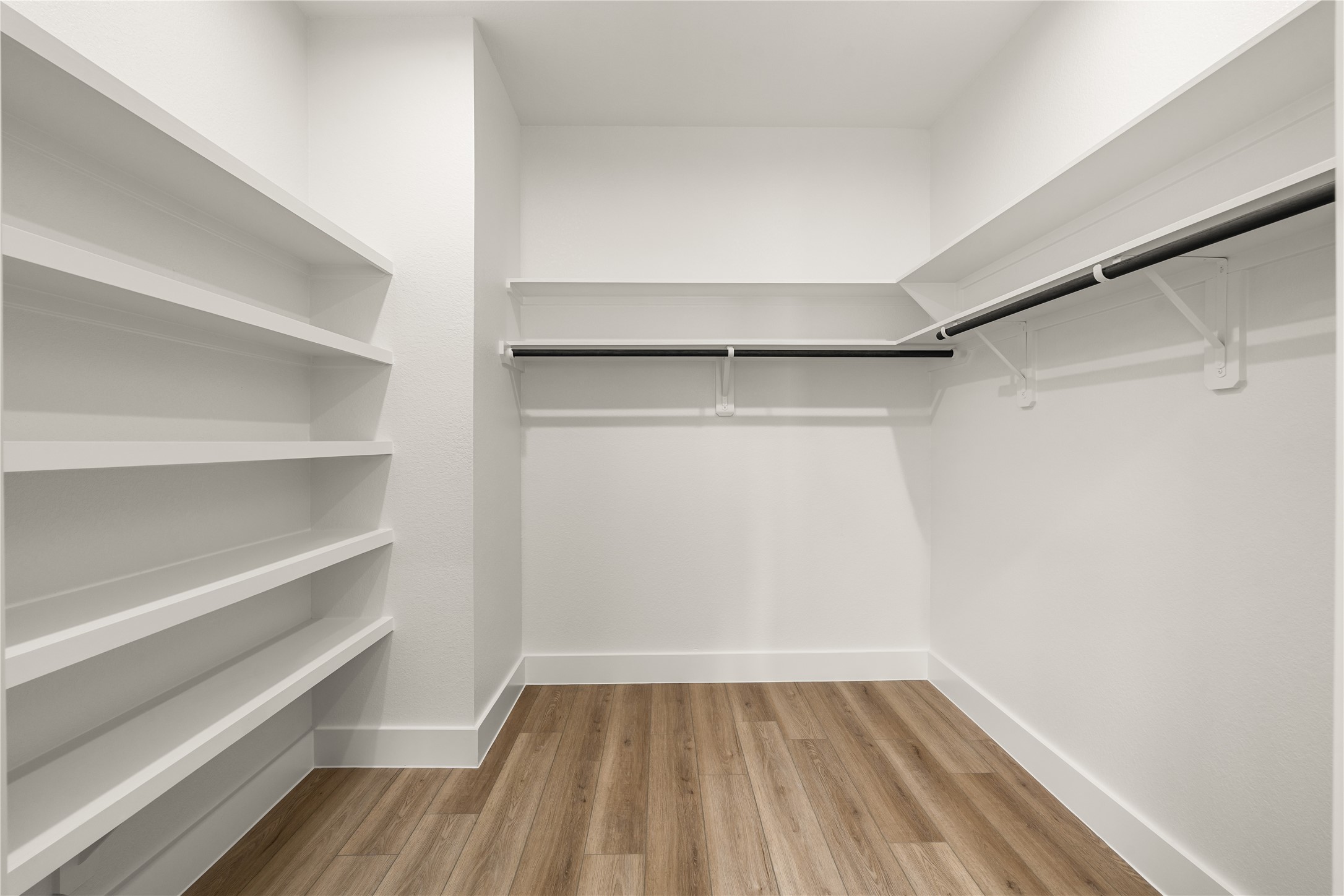 3539 Mainer Street, Unit B Houston, TX 77021 - Photo 16 of 29 Walk-in closet with built-in shelving, hanging rods, and ample space throughout