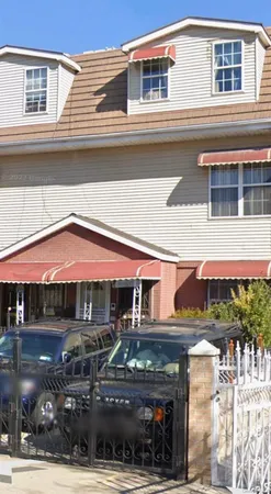 a front view of house with yard