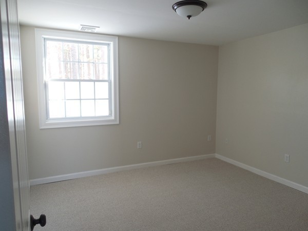 13 Pierceville Road Wareham, MA 02576 - Photo 9 of 9 an empty room with a window