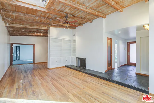 a view of a livingroom with wooden floor