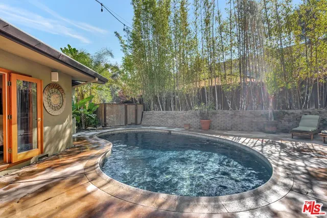 a view of a backyard with a barn