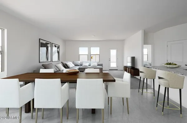 a view of a dining room with furniture and window