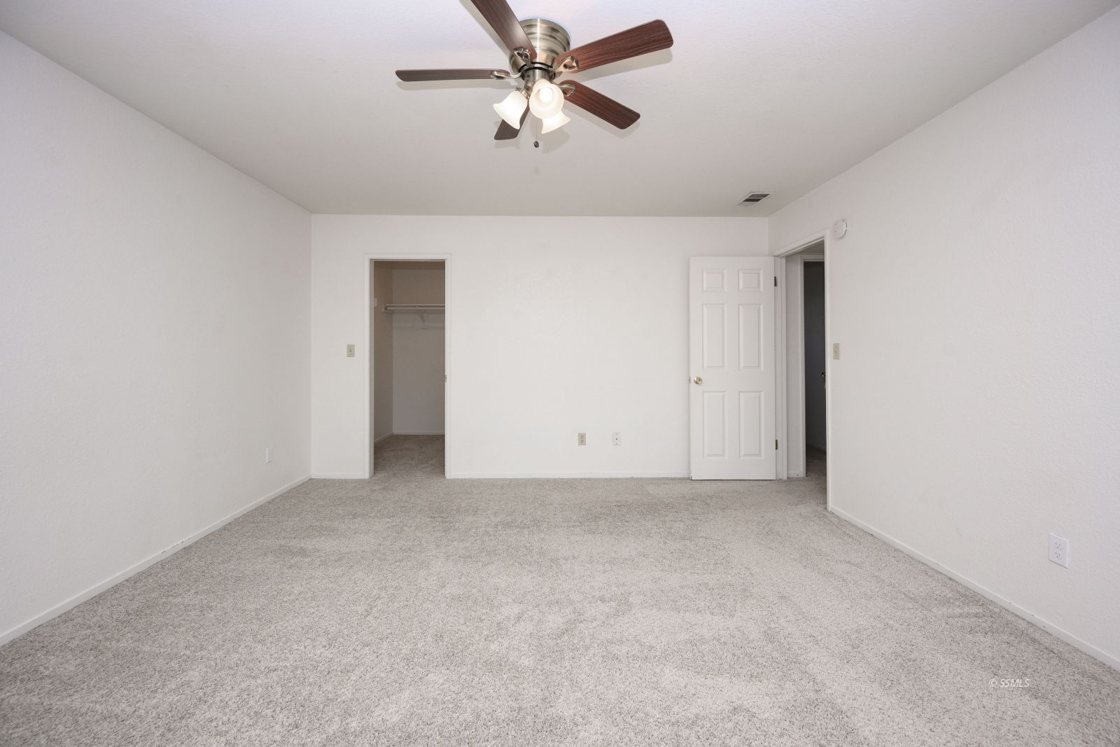 704 Beth Lane Ridgecrest, CA 93555 - Photo 30 of 39 an empty room with chandelier fan