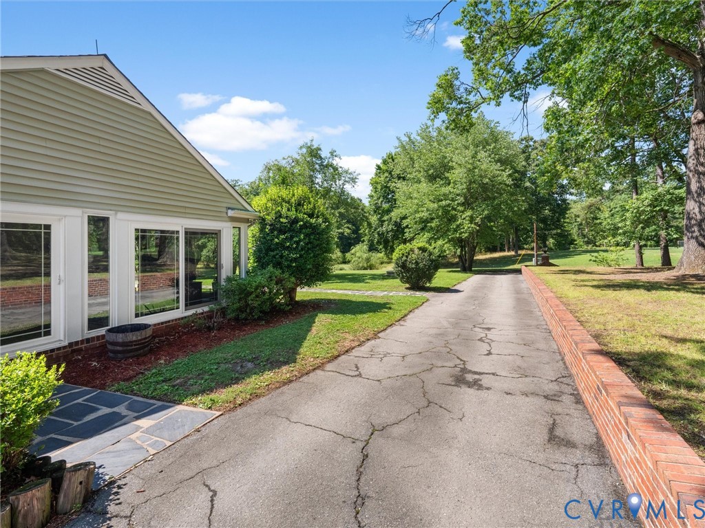 13099 Cedon Road Ashland, VA 23005 - Photo 75 of 92 Driveway, and the exterior of the sunroom