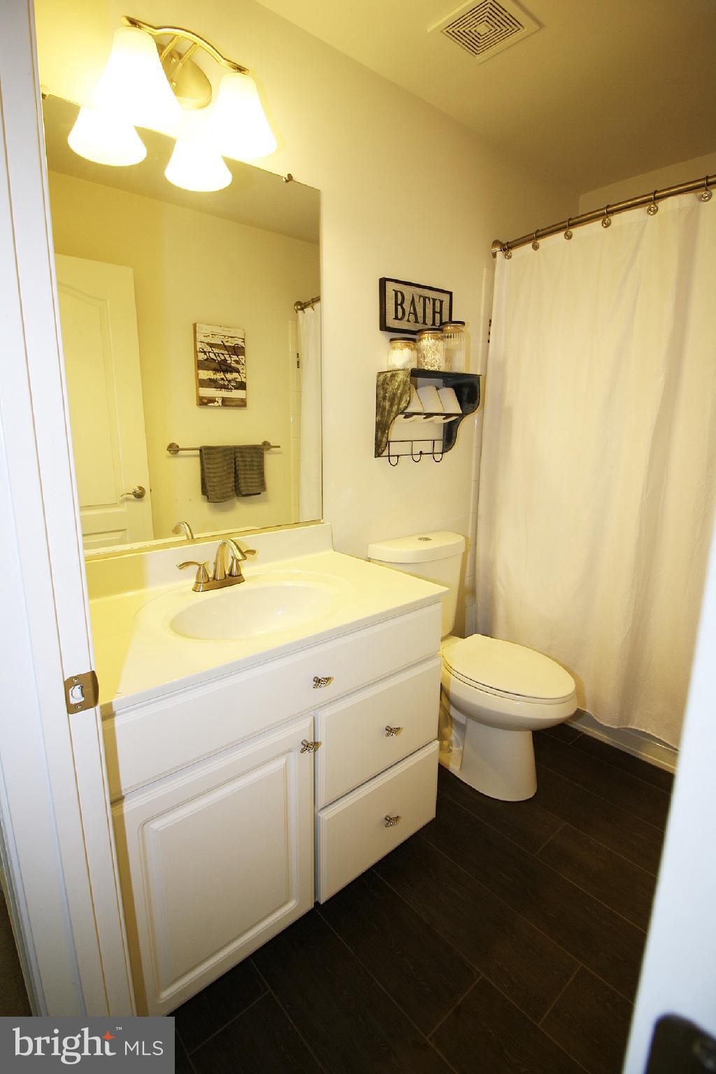 7419 North Point Road Baltimore, MD 21219 - Photo 38 of 46 Full Bathroom w/ Custom Tile