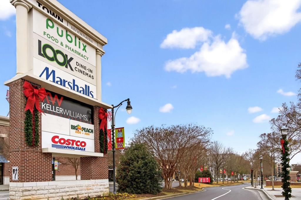 3668 Kingsboro Road Northeast Atlanta, GA 30319 - Photo 23 of 43 a sign that is on a pole