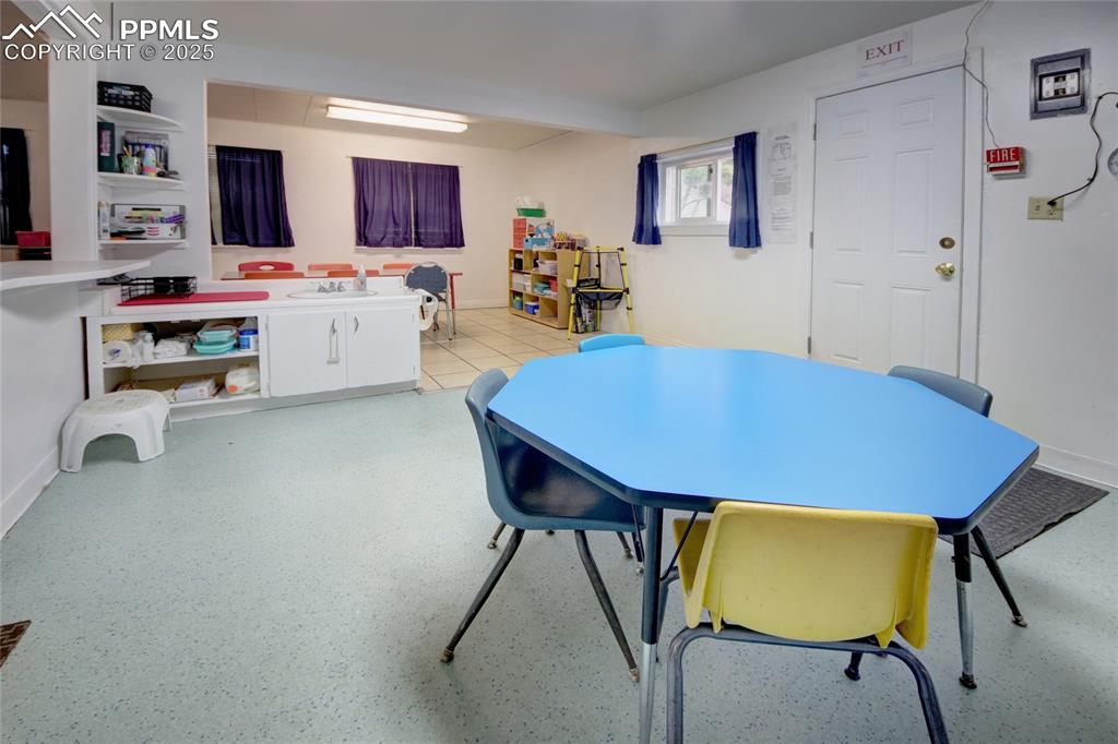 1015 West Cheyenne Road Colorado Springs, CO 80906 - Photo 18 of 33 a view of kitchen dining table and chairs