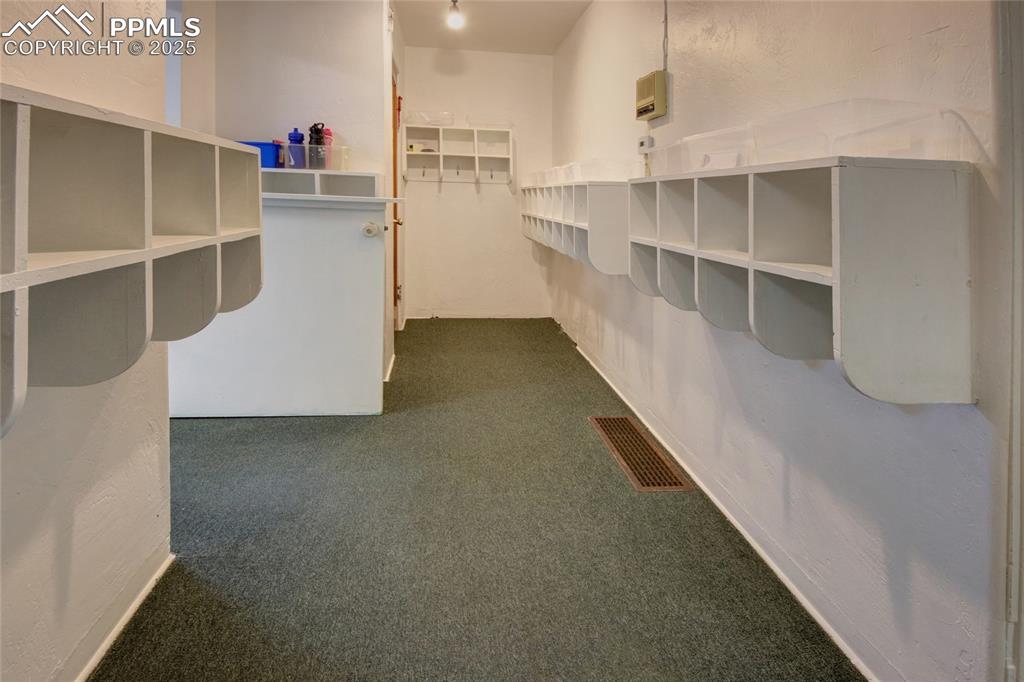 1015 West Cheyenne Road Colorado Springs, CO 80906 - Photo 2 of 33 a view of a living room with cabinets