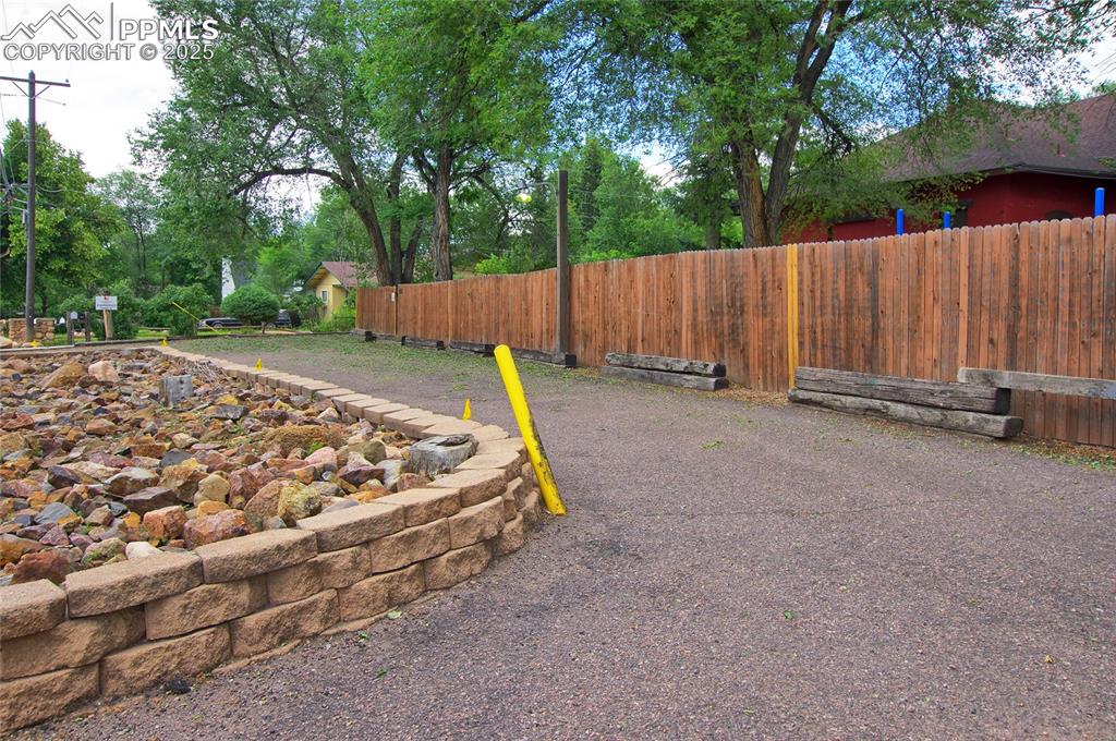 1015 West Cheyenne Road Colorado Springs, CO 80906 - Photo 21 of 33 a view of backyard with green space