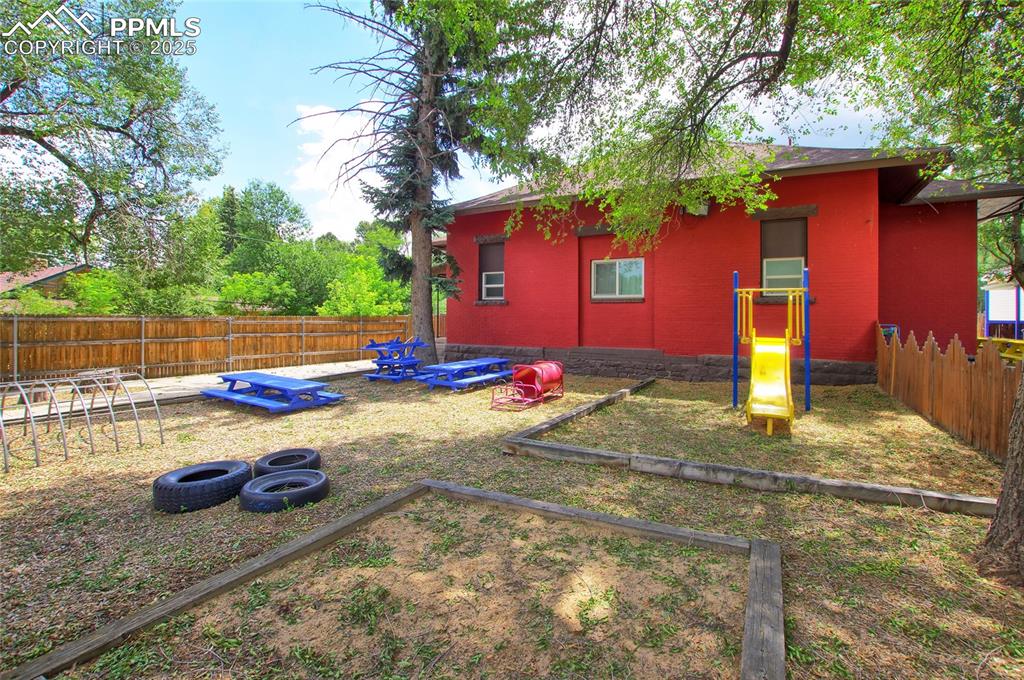 1015 West Cheyenne Road Colorado Springs, CO 80906 - Photo 29 of 33 a view of pool with red brick wall