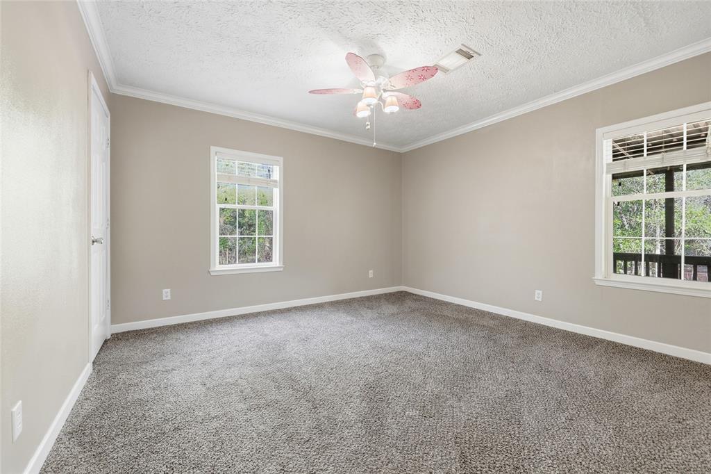 269 Southwest Backwoods Glen Fort White, FL 32038 - Photo 22 of 31 a view of an empty room with a window