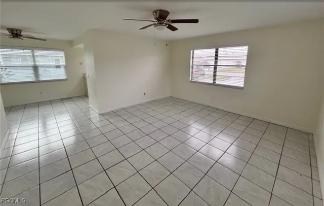 an empty room with windows