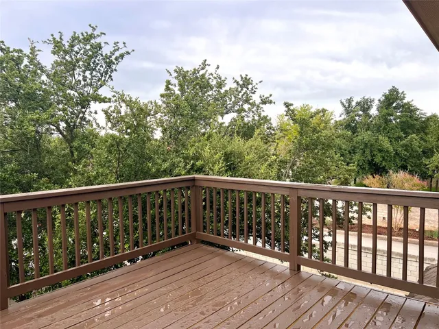 a view of entryway with a chandelier fan