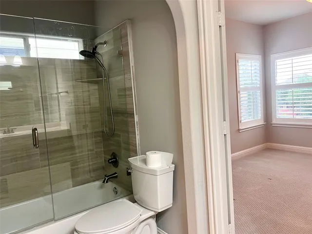 a utility room with sink dryer and washer