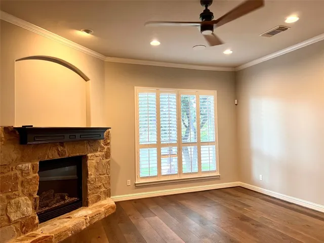 a kitchen with granite countertop a sink and a window