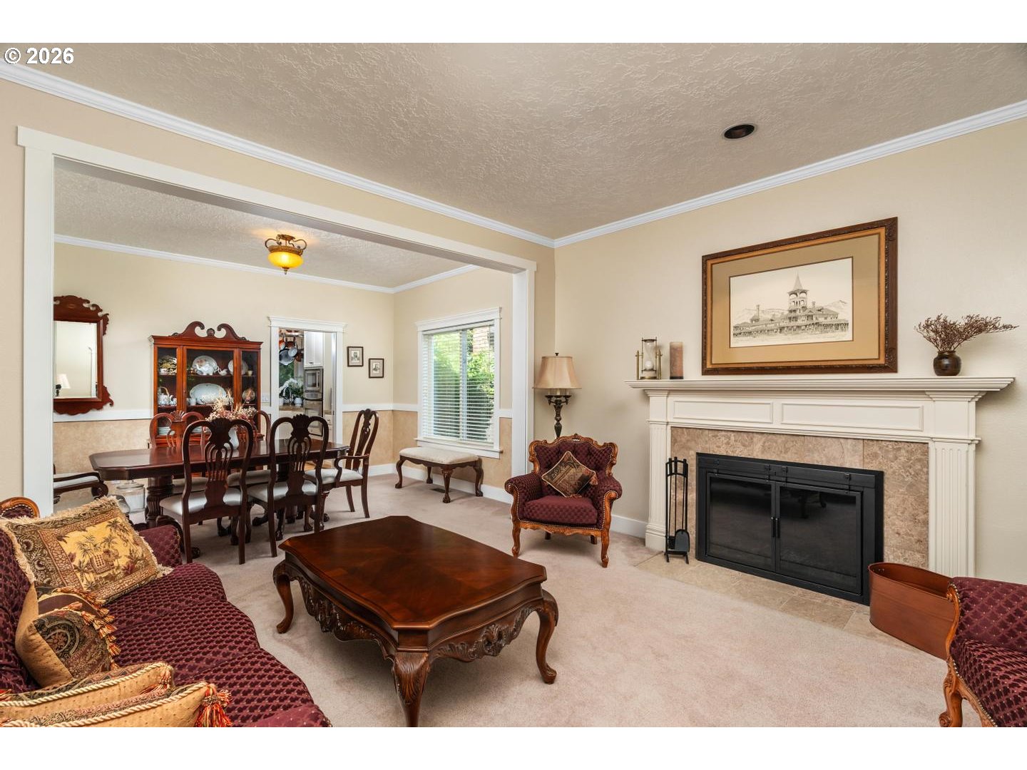 16042 Southwest Waxwing Way Beaverton, OR 97007 - Photo 17 of 48 a living room with furniture and a fireplace