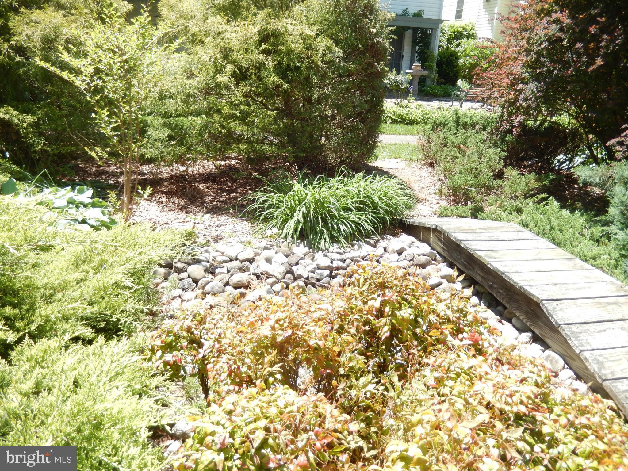 2564 Bear Den Road Frederick, MD 21701 - Photo 25 of 30 Peaceful, Lush Landscaping w/Bridge, River Rocks.