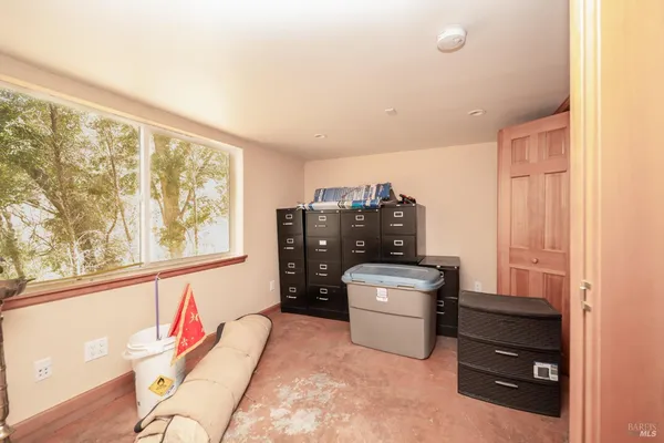 a kitchen with a stove and a refrigerator