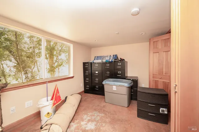 a kitchen with a stove and a refrigerator