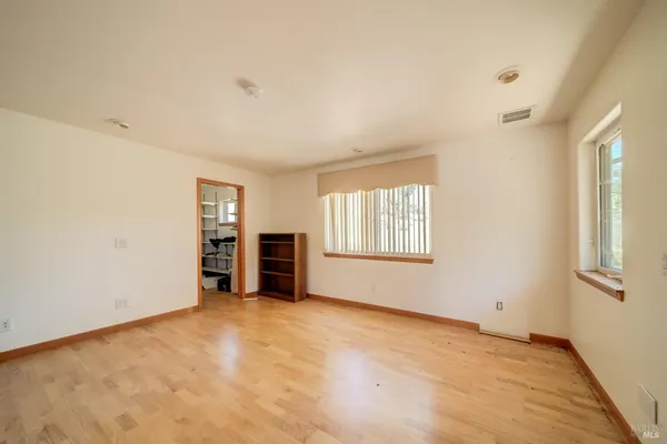 an empty room with windows
