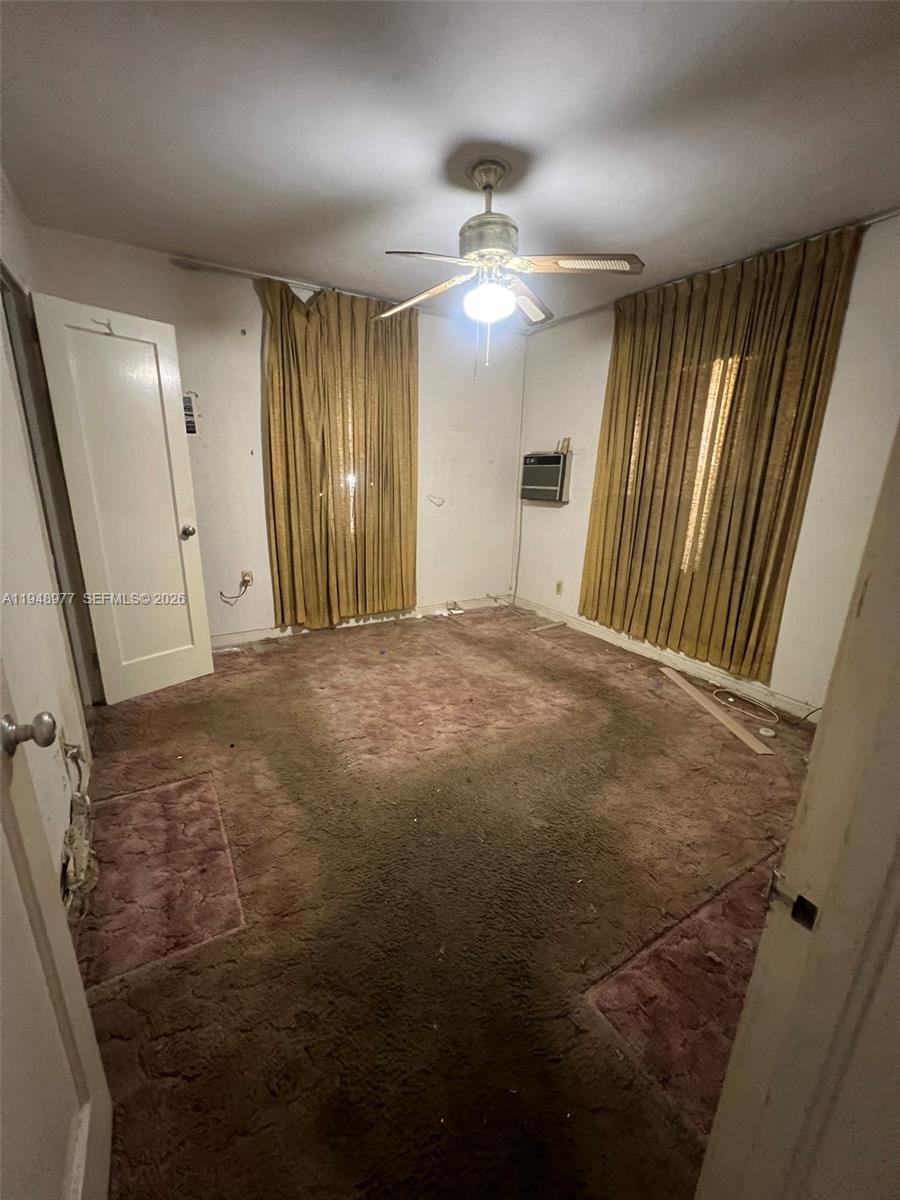 5561 Southwest 5th Terrace Miami, FL 33134 - Photo 20 of 39 a view of an empty room with a window