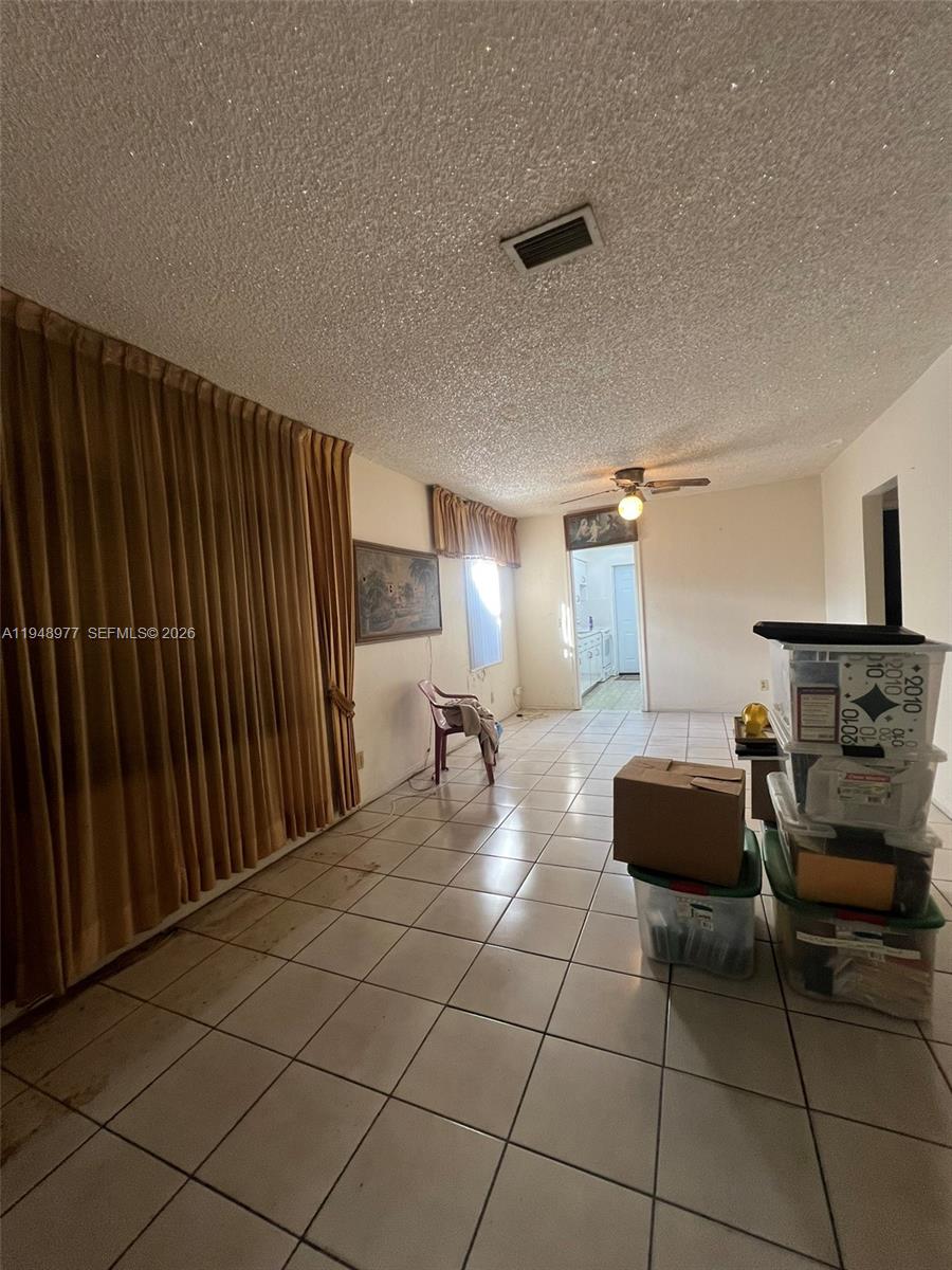 5561 Southwest 5th Terrace Miami, FL 33134 - Photo 31 of 39 a room with furniture a table and chairs